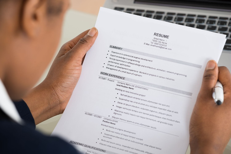 Employer reviews a candidate resume