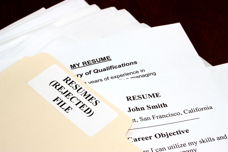 Folder of rejected resumes
